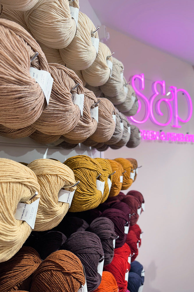 This image shows a close-up of the yarn layout at the new Stephen & Penelope location in Amsterdam.