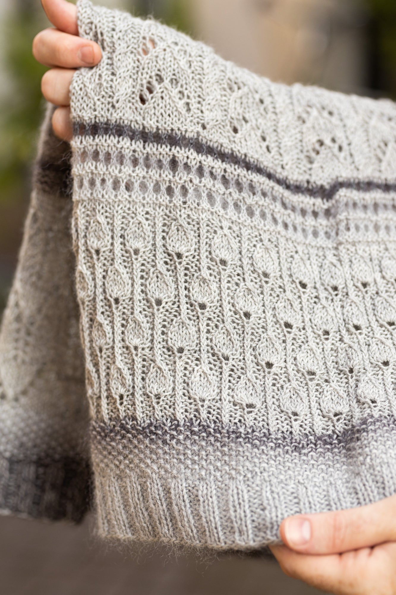 Details of the Glowhair Frost Cowl by Westknits in grey tones.