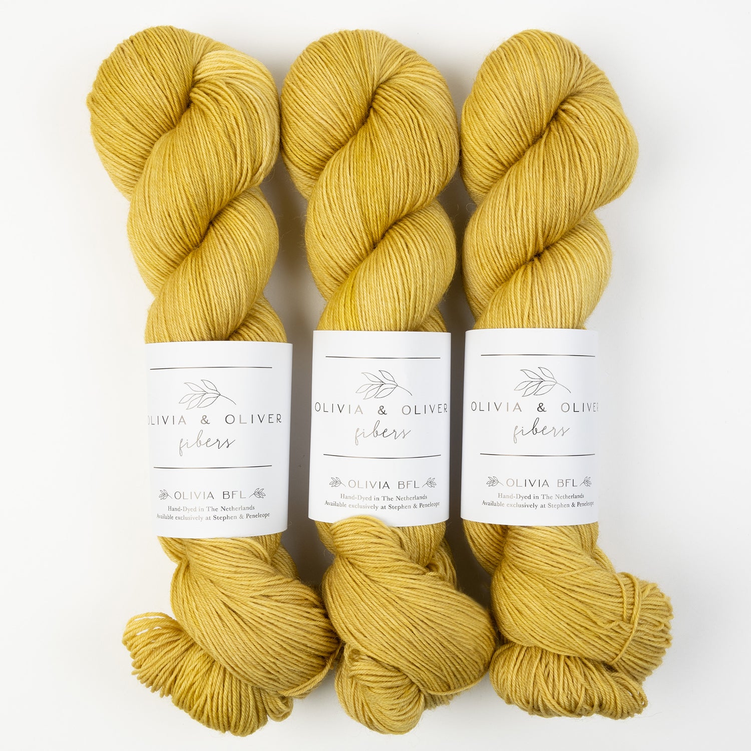 Olivia & Oliver OLIVIA BFL - POACHED PEAR CAKE BFL Wool Blue Faced Leicester Fingering yellow Yarn