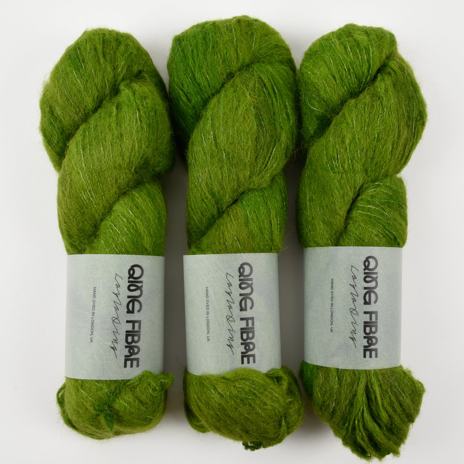 Qing Fibre MELTED BABY SURI - TUXEDO MASK Alpaca Merino wool Silk Sport green Yarn