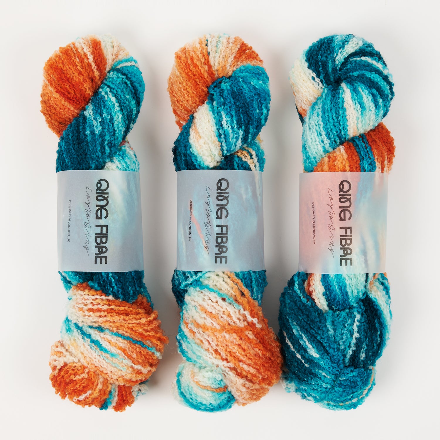 Qing Fibre TEDDY - CAVE Merino wool DK blue orange multicolour Yarn