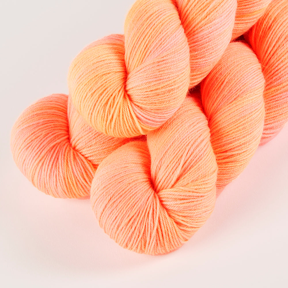 Twisted Ambitions SWEET SOCK - FRESHLY SQUEEZED Merino wool Nylon Fingering pink peach Yarn