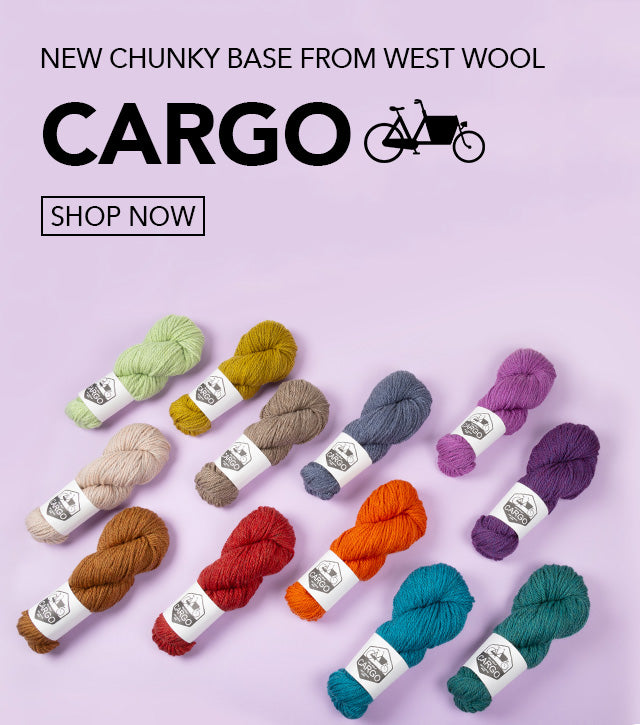 This image advertises the release of a new chunky base from West Wool: Cargo. The text includes a "shop now" button and the Cargo black logo. The image shows various skeins of Cargo in various colours, such as orange, purple, blue, green on a lilac background. 
