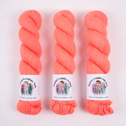 Twisted Ambitions SWEET SOCK - SUNRISE Merino wool Nylon Fingering neon coral Yarn