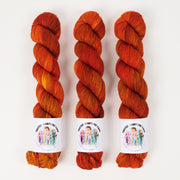 Twisted Ambitions WICKED DK - SUNSET Merino wool DK red Yarn