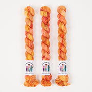 Twisted Ambitions SWEET SOCK MINI - GLITZ Merino wool Nylon Fingering orange Yarn
