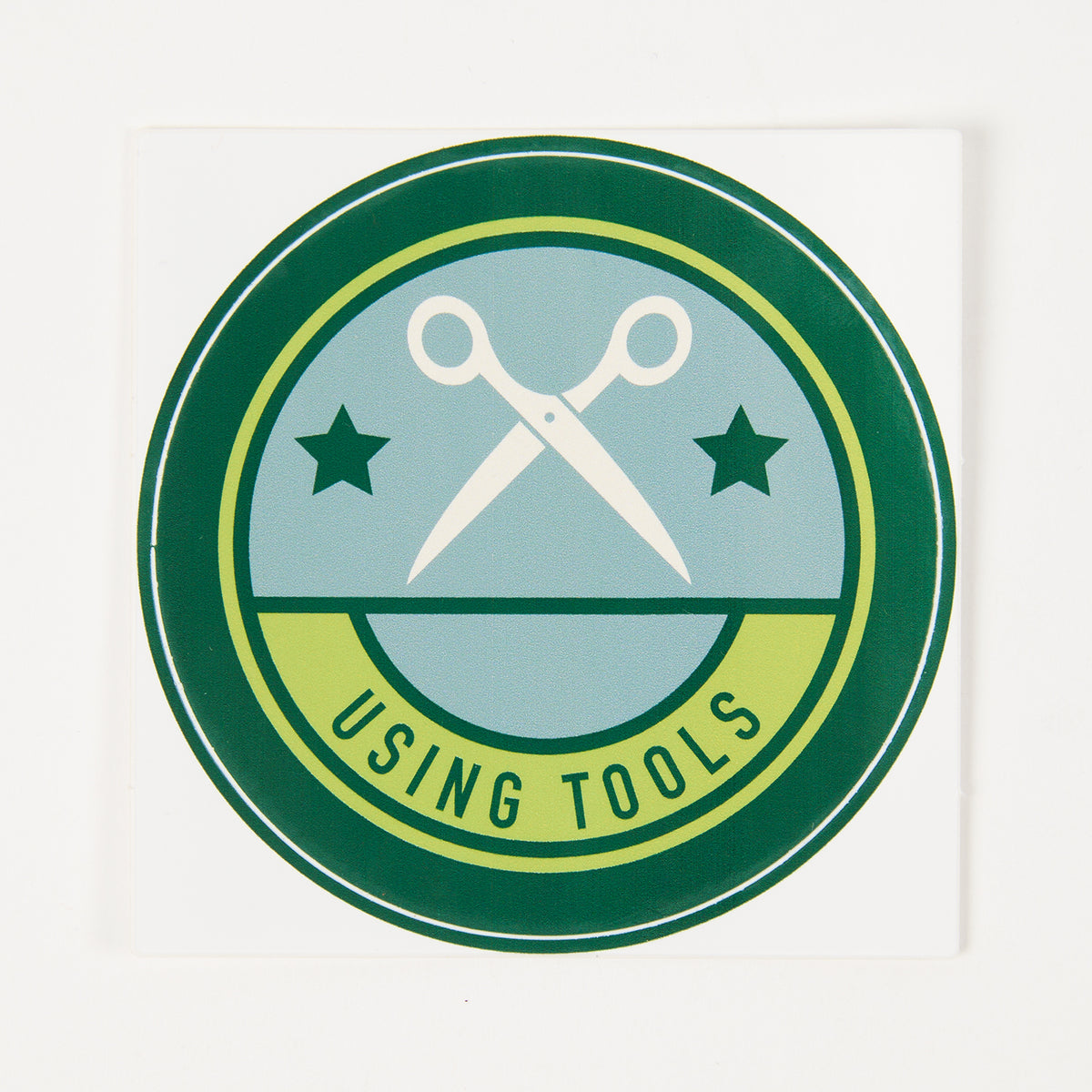 "USING TOOLS" STICKER