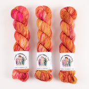 Twisted Ambitions SWEET SOCK - GLITZ Merino wool Nylon Fingering pink coral Yarn