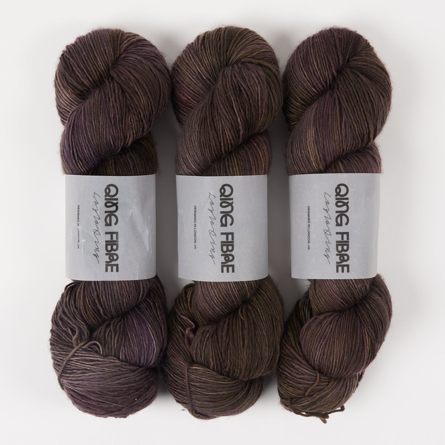 Qing Fibre DASHING SASSY - ONYX Merino wool Fingering brown Yarn