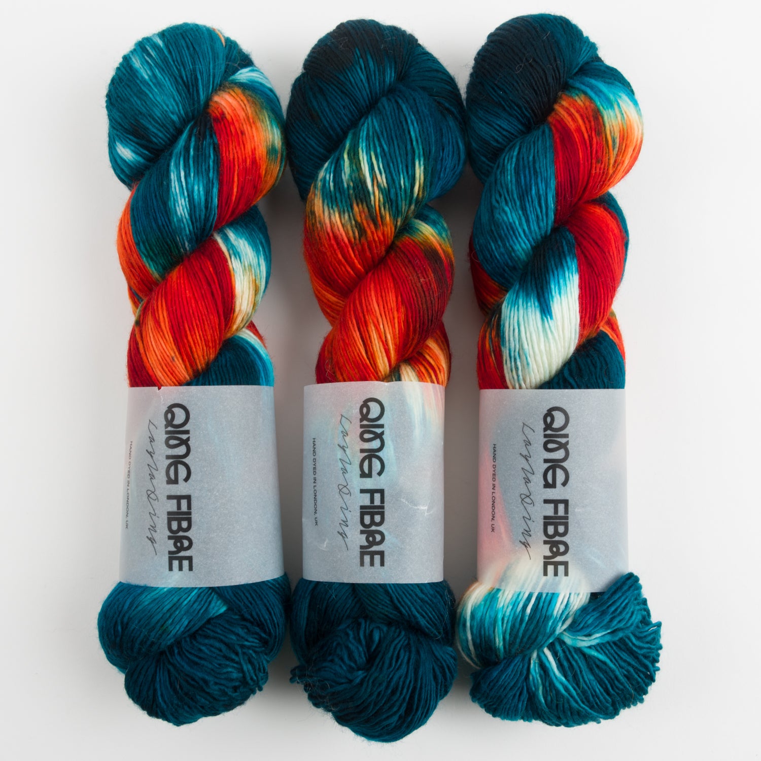 Qing Fibre DASHING SASSY - CAVE Merino wool Fingering blue red multicolour Yarn