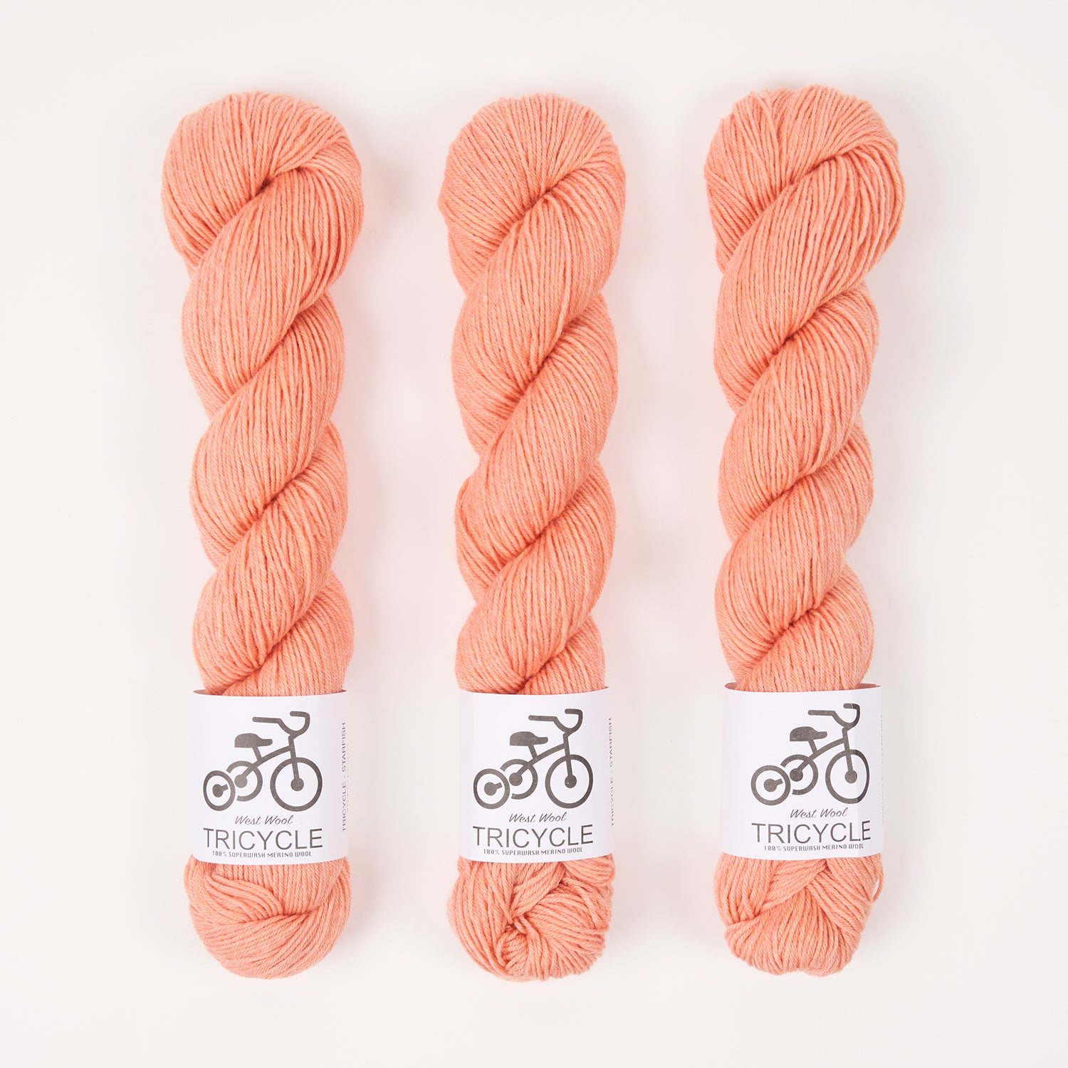 West Wool TRICYCLE - STARFISH Merino wool Fingering pink peach Yarn