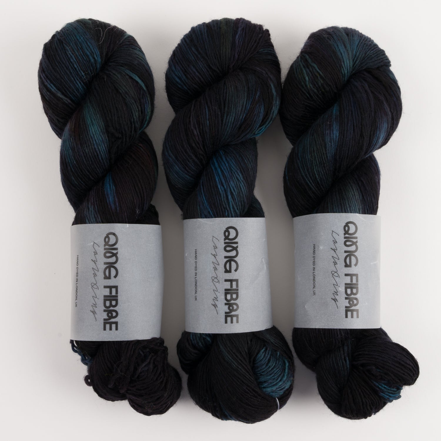 Qing Fibre DASHING SASSY - SOLSTICE Merino wool Fingering blue black Yarn